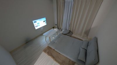 やわらかな照明とプロジェクターでくつろぐ、大人の隠れ家空間。 - BreakTimeかしわの室内の写真