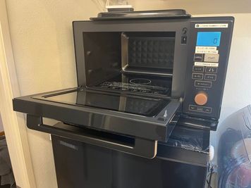 オーブンも使える電子レンジ（有料キッチンオプション） - スタジオボン　 スタジオボン　大須　の設備の写真