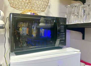 電子レンジ（貸出機類） - カラオケバー neo 梅田2号店の設備の写真