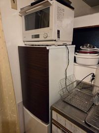 キッチン側の冷蔵庫とオーブンレンジです - 荘苑覚王山 SSSの設備の写真