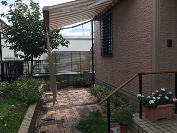 玄関 - さいたま市Shikate レンタルリビングの入口の写真