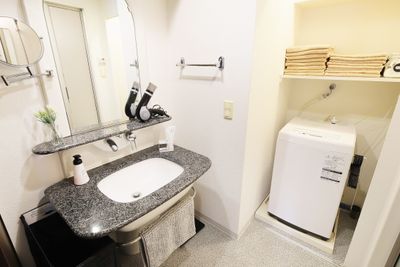 洗面脱衣所
洗濯機は無料でご利用いただけます。 - Namba-studioの設備の写真