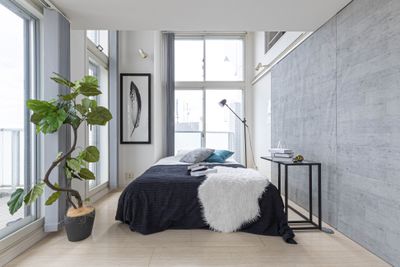 白とコンクリートを基調としたシンプルなベッドスペース
※撮影向けベッドセットあり（有料） - SHINJUKU#1 | シンジュク#1 LAG SPACEの室内の写真