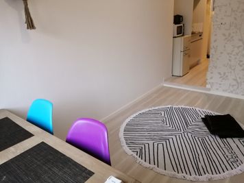 壁にかわいいインテリアがあります。 - Hikario新宿 ワークスペース２０１の室内の写真