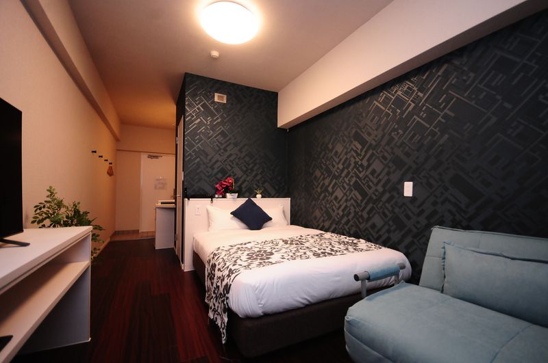 JAPANESQUE 客室3（壁紙ネイビー）511号室の室内の写真