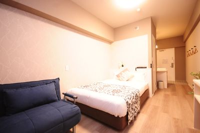 JAPANESQUE 客室4（壁紙ベージュ）601号室の室内の写真