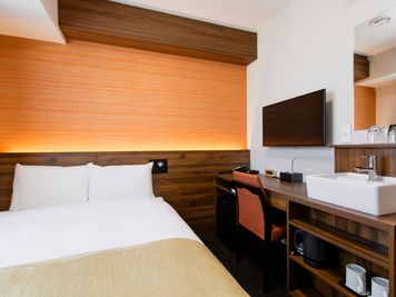 客室一例 - ホテルウィング高松 デラックスシングル/スタンダードダブル【2名様まで】の室内の写真