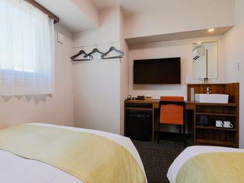ホテルウィング高松 スタンダードツイン【2名様まで】の室内の写真