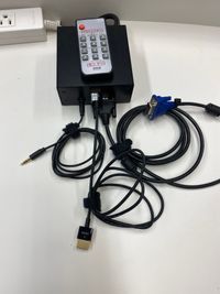 【PARM-CITY131貸会議室　多目的ホール】投影画像切替機器リモコンと各種接続コード｜ - PARM-CITY131貸会議室 仙台｜PARM-CITY131貸会議室　多目的ホール｜最大75名の設備の写真