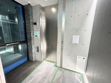 【1階エレベーターホール】 - TIME SHARING 新富町 エスパシオ新富町 6Fの入口の写真