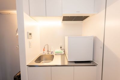 流し台、冷蔵庫 - レンタルジムAivic築地の設備の写真