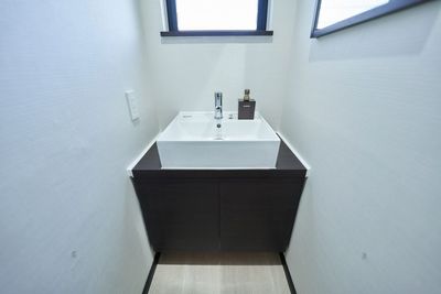 洗面台 - オフィスネスト麻布十番 201号室の設備の写真