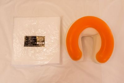 顔に負担をかけないフェイスクッションと使い捨てのピローシート - レンタルサロン AndSTAR -Luna- 赤坂店の設備の写真