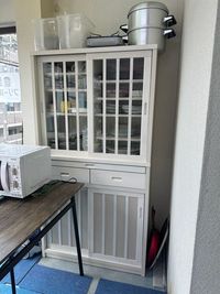 食器棚に入っている食器は自由にお使いください - 豊里フリールーム Ａ教室の設備の写真