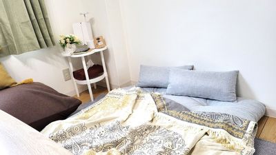 ソファーを広げると180cmあります - 京都市役所前 まるちゃんの部屋303号室【おうちスペース】の室内の写真