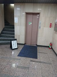 1Fエレベーター前です。セミナーのt時はここにポスター掲示可能です。 - 健康ひろばの入口の写真
